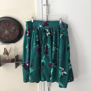 Fully lined accordion pleated skirt